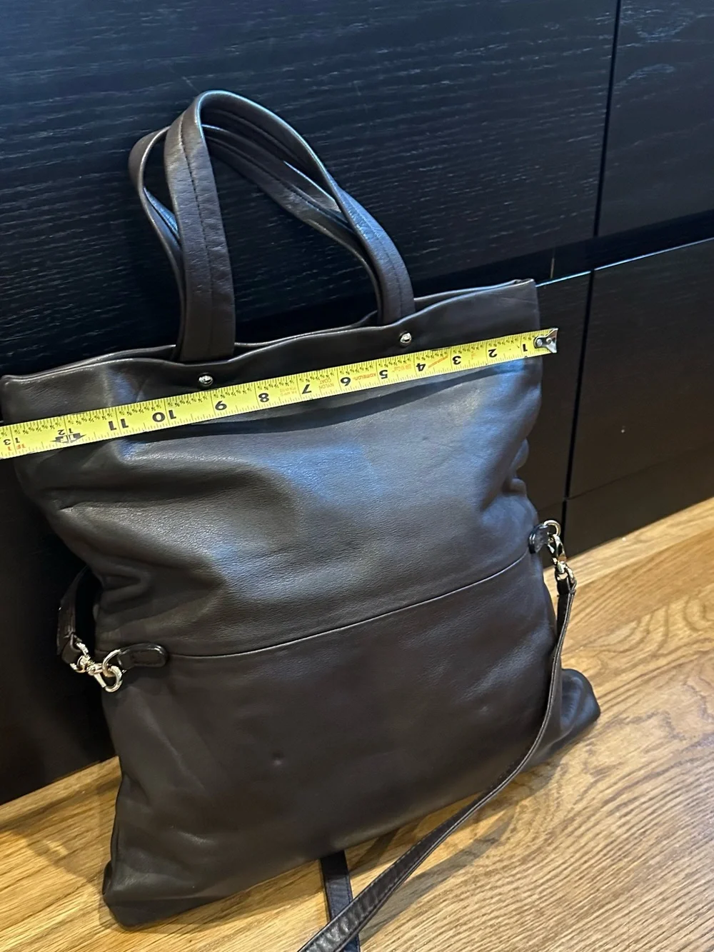 kate spade black leather tote with star emblem hardware